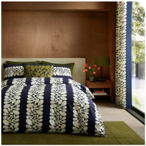 Orla Kiely Sycamore Stripe Space Blue duvet bedset. A bold design that uses shapes inspired by sycamore tree seeds, in a timeless combination of navy blue and cream, printed onto a 200 thread count 100% cotton base.