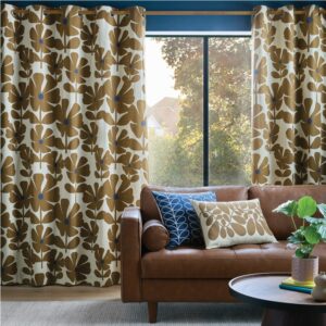 Pair of fully lined curtains by Orla Kiely in the Wildflower coffee design, eyelet curtains with printed Linear Stem lining