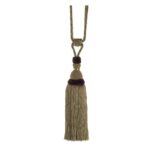Pistachio Green Swish Moulin curtain tieback with a corset design and tassels.