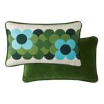 Orla Kiely Retro Flower Stripe Riviera filled cushion. In a palette of bright blue and vivid green shades, this eye-catching cushion features a tex-tured cotton face and a soft, plain cotton velvet reverse and piped edge. With zip closure.
