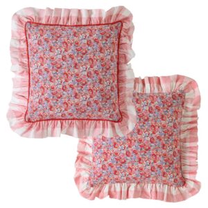 Cath Kidston Ditsy Archive pink cushion. The classic Ditsy archive print features dainty blooms in a joyful palette of red, coral, soft pink and lilac. A large, pink gingham check is printed on to a soft cotton ruffle edge and a smart, red piped trim detail frames this joyful cushion.