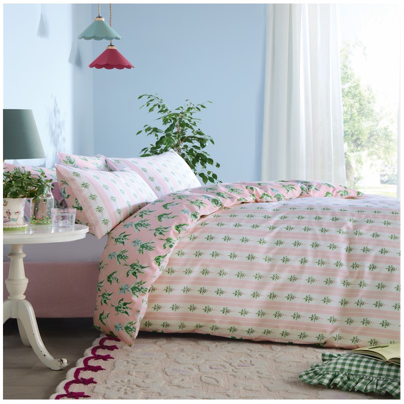 Cath Kidston Lily of the Valley Soft Pink bedset Cath Kidston Lily of the Valley Soft Pink bedset. With hand-painted bunches of Lily of the Valley that are drawn tied with a bow, an ode to friendship - a flower known to represent love, luck and joy. This crisp 180tc 100% cotton percale bed linen is backed with a graphical pink stripe reverse and has a painted Cath Kidston crest detail. 180 thread count and 100% cotton cover.