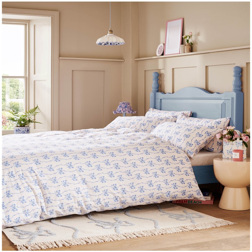 Cath Kidston Ribbon Bow Cornflower bedset Cath Kidston Ribbon Bow Cornflower bedset. Featuring a sweet, linear bow design. The soft cornflower blue hues create a peaceful, serene atmosphere, while the 100% cotton fabric ensures comfort and durability for a restful night's sleep.