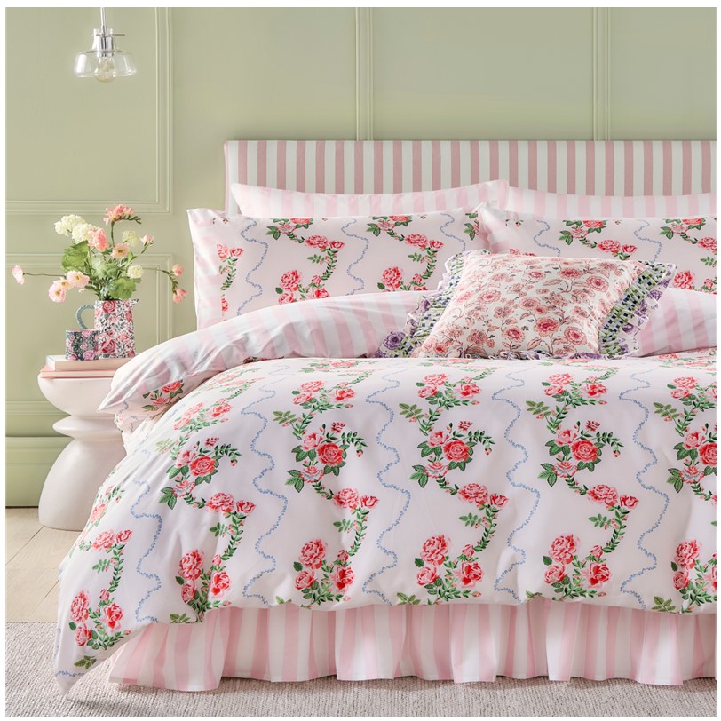 Cath Kidston Rose Flutter Pink bedset Cath Kidston Rose Flutter Pink bedset. Hand painted Roses dance amongst delicate foliage alongside a hand-painted ditsy wiggle which is contrasted with a bold, candy stripe. Printed onto soft 100% cotton percale in a dreamy palette of pale plaster pink, coral shades, and a vibrant green leaf.