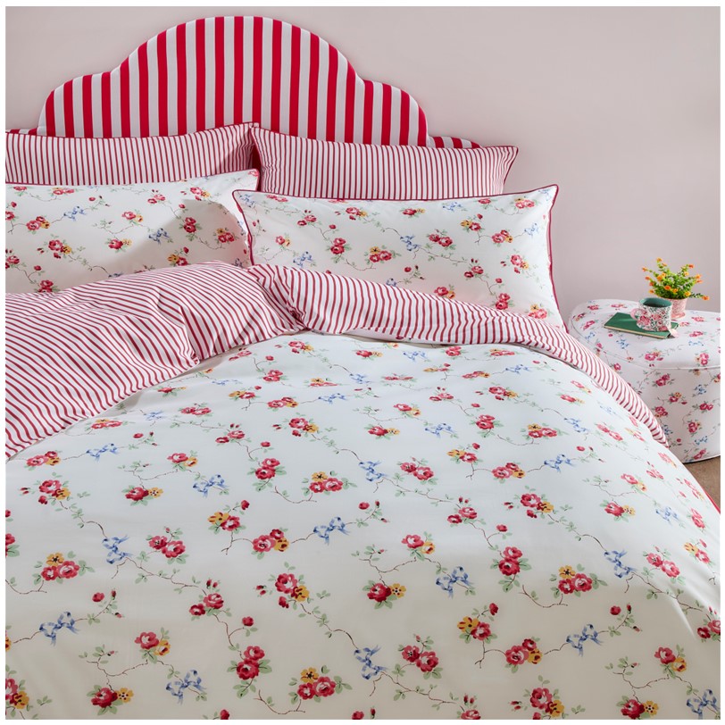 Cath Kidston Rose and Bows bedset Cath Kidston Rose and Bows bedset. The Rose And Bows Duvet Set by Cath Kidston is a reversible bedset that features modern touch to a traditional rose, bow and posies design with splashes of bright colours that will give your bedroom a sunny, natural feel. The bedding is machine washable making it easy to keep fresh and looking beautiful. Made with 100% cotton, this bedding is soft to the touch and durable.