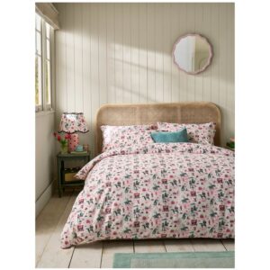 Cath Kidston Cow Girl Multi Bedding. The soft 100% cotton fabric base ensures a comfortable night sleep and durability, making it perfect for cozy evenings. Ideal for young adventurers or anyone who loves a touch of nostalgic Cath charm, this bedset brings a taste of the Wild West right into your bedroom in true Cath style.