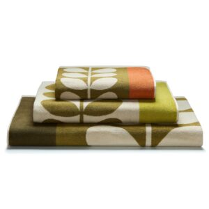 Orla Kiely Stem Check Hazel/ochre Towels. Rich hazel and ochre shades are woven in a checkerboard-inspired layout to frame Orla Kiely’s signature stem motif, on this retro, 100% cotton towels/bathmat.