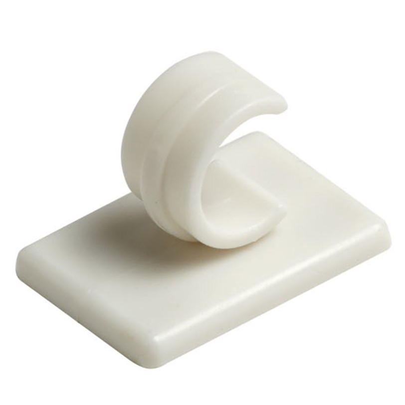 Centre Supports White, they have a sticky foam pad on the back for attaching to the wall